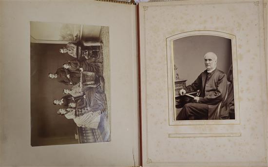A leather photograph album of mostly 19th century portraits